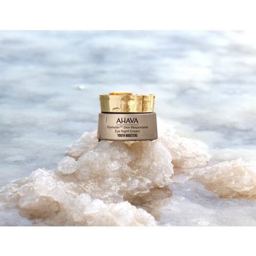 Ahava Osmoter&amp;trade; Skin-Responsive posvetlitvena krema za predel okoli oči proti zabuhlosti in temnim kolobarjem 15 ml Slike