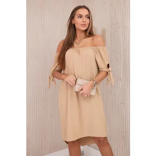 Kesi Dress with a longer back and ties on the sleeves Camel