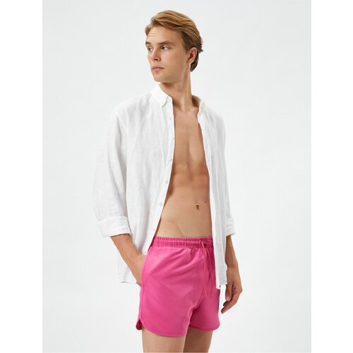Koton Swimsuit Shorts Short waist with a tie-down pocket. Cene