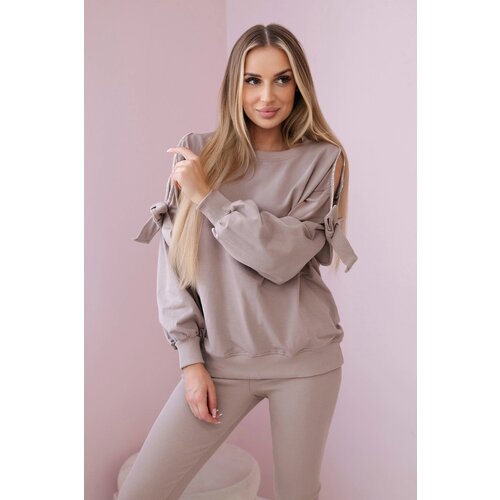 Kesi Women's set of sweatshirt with bow and leggings - dark beige Cene