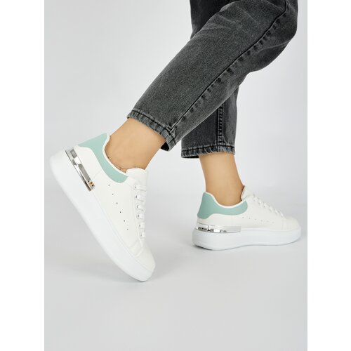 Shelvt White women's sneakers with a green element Cijene