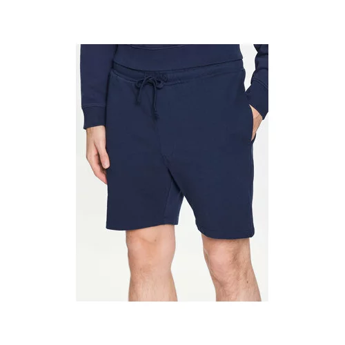 Tommy Jeans Športne kratke hlače College DM0DM16331 Mornarsko modra Regular Fit