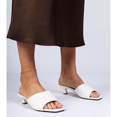  White low heel mules Launay Cene