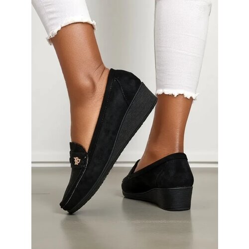 Resti Women's moccasins on a low wedge Polefle Cene