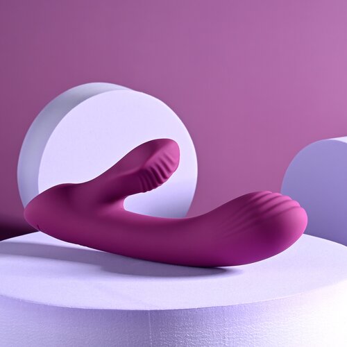 Playboy Bitty Bunny - akumulatorski vibrator s klitoralnim dodatkom (roza) Slike