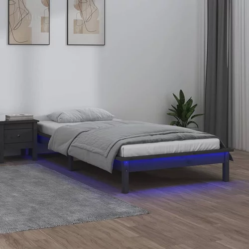 vidaXL LED posteljni okvir siv 90x200 cm trden les