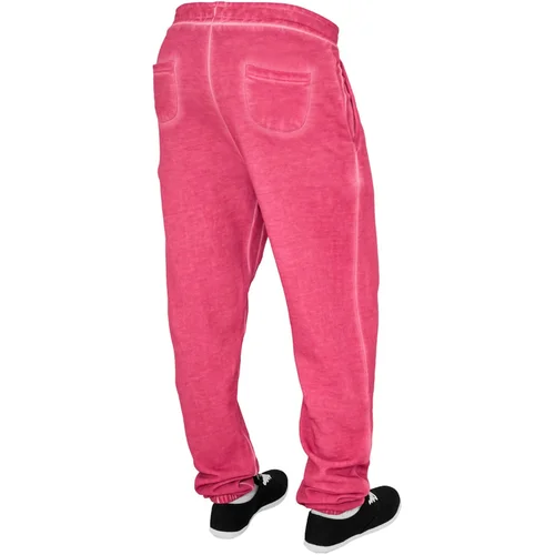 UC Ladies Women's fuchsia sweatpants in spray