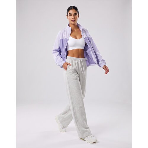 New Balance &amp;Scaron;portne jope in jakne TRACKSIDE WOVEN JACKET Vijolična Slike