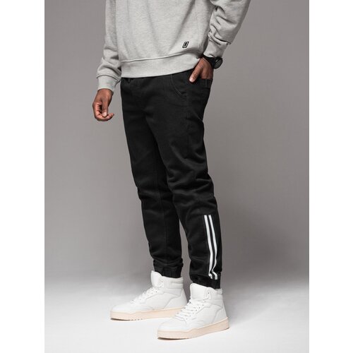 Ombre Men&amp;#039;s denim joggers with asymmetrical stitching - blue Slike