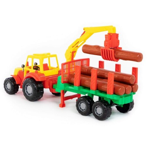 Polesie traktor s balvanima u prikolici Slike