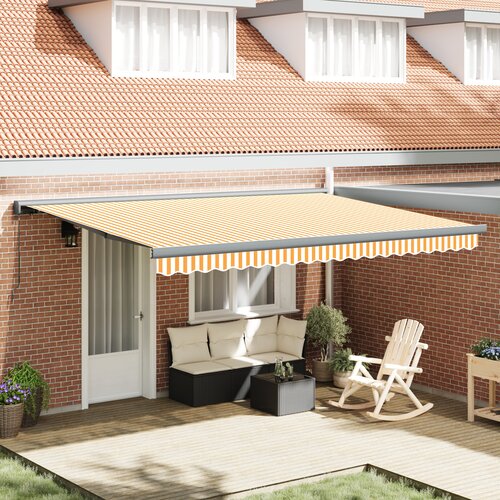 VidaXL Ročna retraktibilna tenda oranžna in bela 450x300 cm Slike