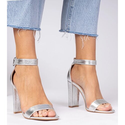 D/CEO marka niezdefiniowana Silver sandals with an ankle strap on a block heel Miledia Cene