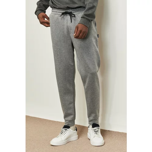 AC&Co / Altınyıldız Classics Men's Gray Standard Fit Normal Cut Elastic Waist And Legs. Comfortable Sports Sweatpants.
