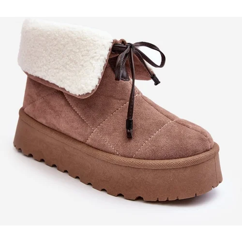 Kesi Beige snow boots on the Olimuka platform with sheepskin