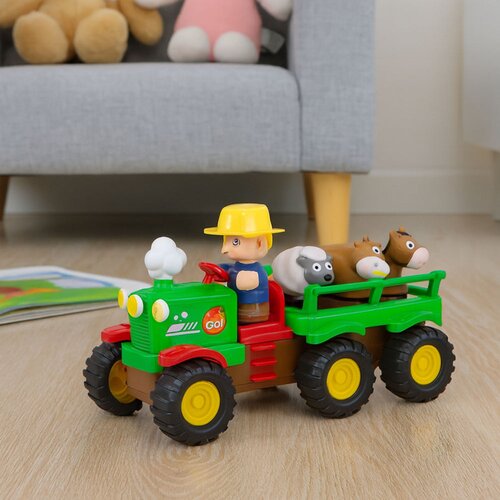  Edukativni traktor sa prikolicom i farmerom sa zvučnim efektima - village Slike