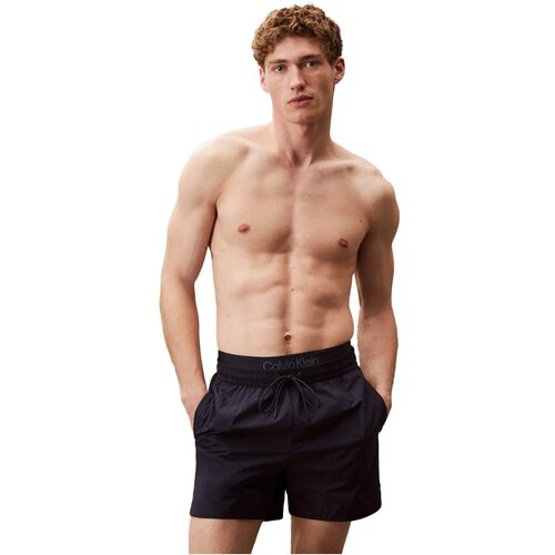 Calvin Klein Jeans Kopalke / Kopalne hlače KM0KM01104 Modra Slike