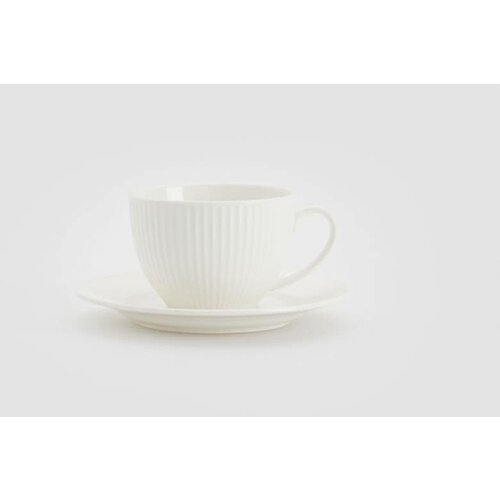Reserved porcelanasta skodelica s krožnikom - bela Cene