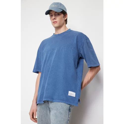 Trendyol Men's Indigo Oversize/Wide Fit 100%Cotton T-Shirt with Stitched Label Fading/Faded Effect Slit