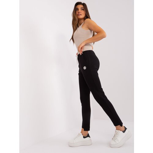 Fashion Hunters Black women's cotton sweatpants Cene