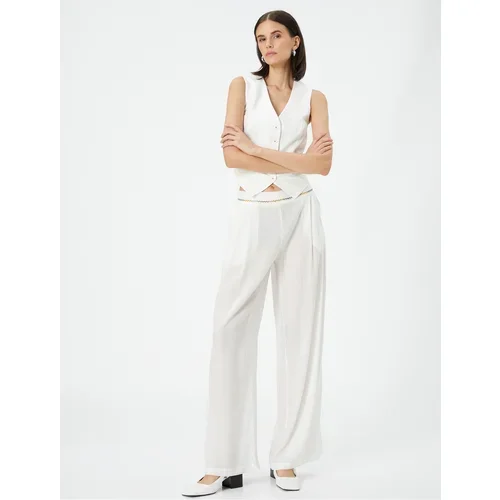 Koton Palazzo Trousers Loose Fit, Normal Waist, Pockets with Embroidery Detail.