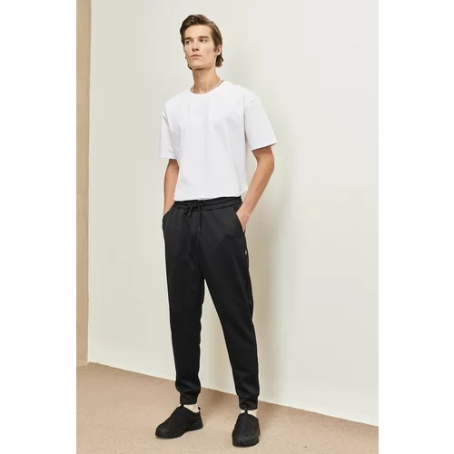 AC&Co / Altınyıldız Classics Men's Black Standard Fit Regular Cut Comfortable Sports Sweatpants with Elastic Waist and Legs