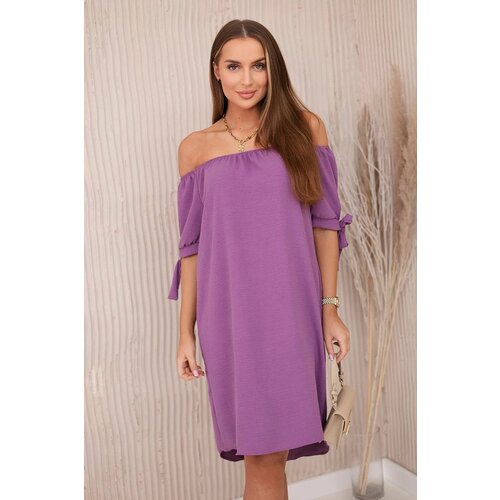 Kesi Dress with a longer back and ties on the sleeves plum Cene