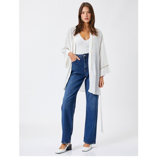 Koton The Belted Waist Kimono has a loose fit. Slike
