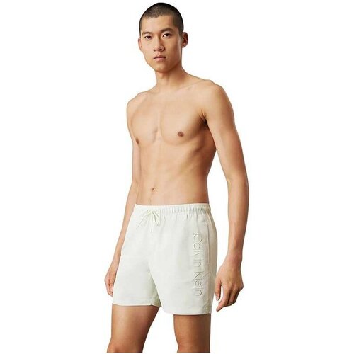 Calvin Klein beli muški kupaći CKKM0KM01166-LTY Cene