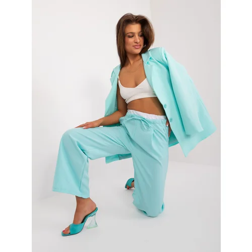 Fashion Hunters Mint fabric trousers with white belt