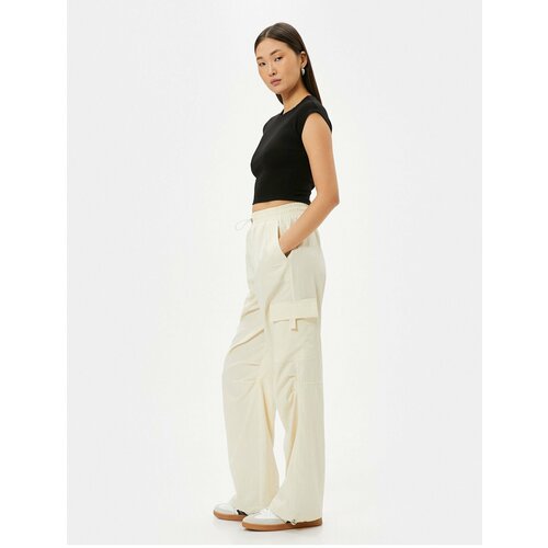 Koton Parachute Trousers with Cargo Pocket and Elastic Waist with Stopper Cene