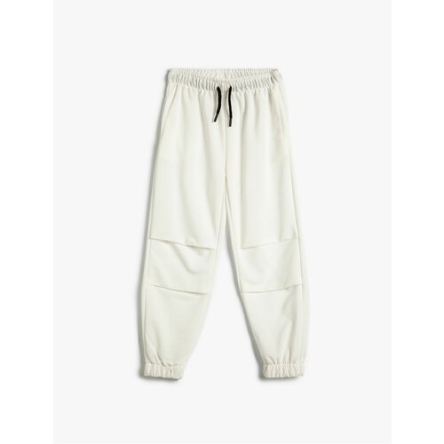 Koton Basic Jogger Sweatpants with Tie Waist, Pockets, Tile Detail. Slike