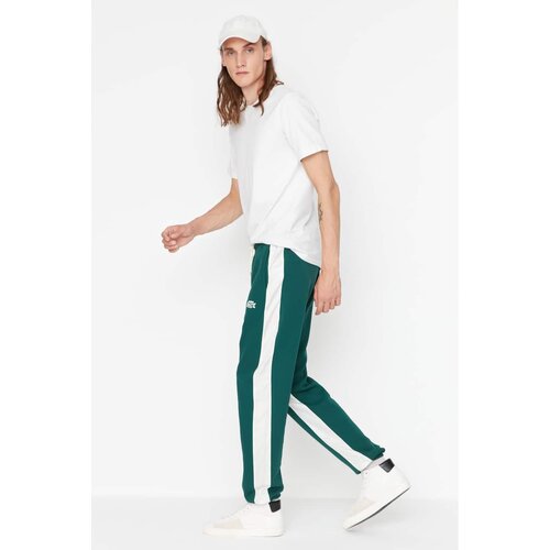 Trendyol Emerald Green Men's Regular Fit Rubber Leg Paneled Printed Sweatpants Cene