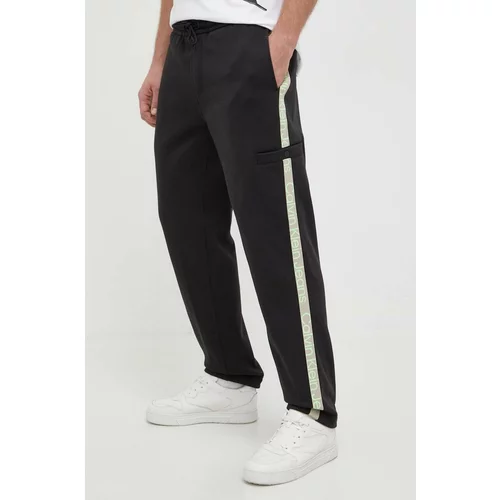 Calvin Klein Jeans Donji dio trenirke boja: crna, s aplikacijom