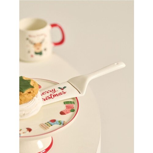 Sinsay Božićna lopatica za tortu Slike