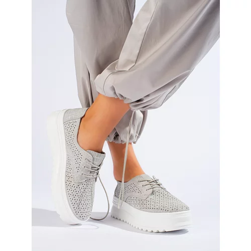 SHELOVET Leather openwork sneakers on a high platform silver