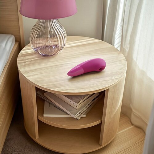 Womanizer Enhance - vibrator za klitoris s pulsirajućim zrakom (ružičasti) Slike