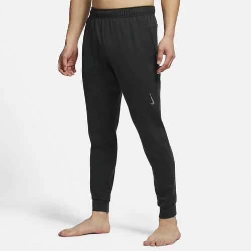 Nike Spodnji del trenirke Yoga Dri-FIT CZ2208 Siva Standard Fit