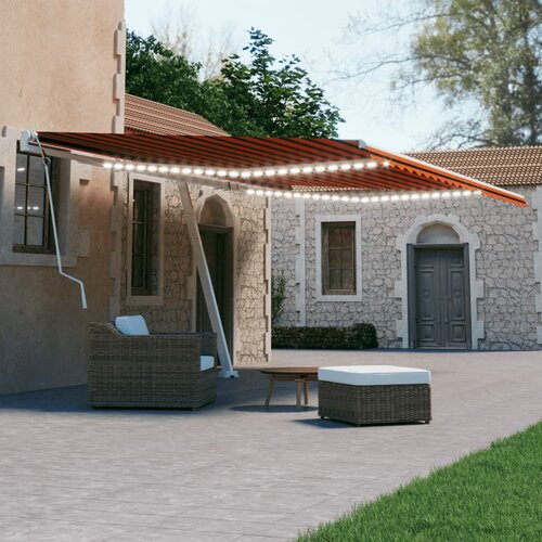 vidaXL Ročno zložljiva tenda z LED lučkami 600x300 cm oranžna in rjava Cene