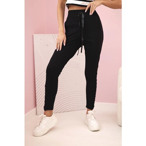 Kesi Women's trousers with a frill on the sides black Cijene