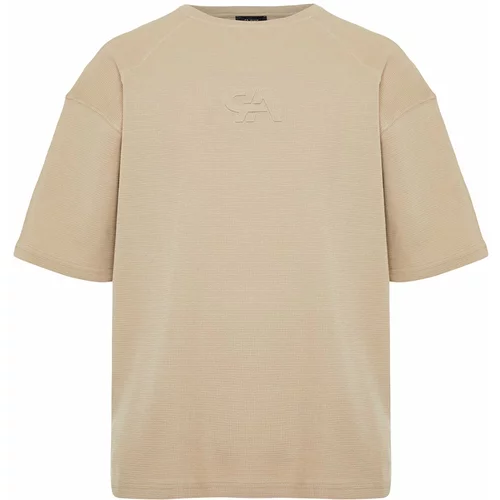 Trendyol Premium Mink Men's Oversize/Wide-Fit Textured Waffle Fluffy Text Printed Short Sleeve T-Shirt