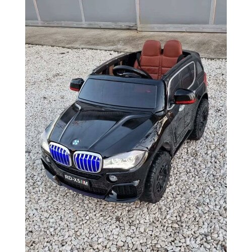  dečiji licencirani auto BMW X5 RD 500 na akumulator sa kožnim sedištem, mekim gumama i mp4 plejerom - crni Cene