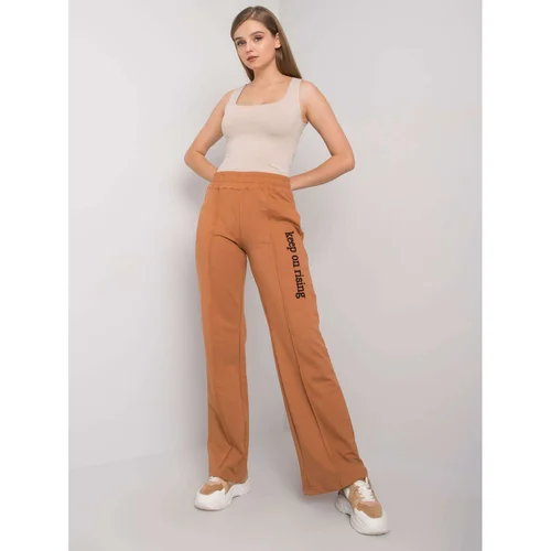 Fashion Hunters Light brown straight sweatpants with an inscription