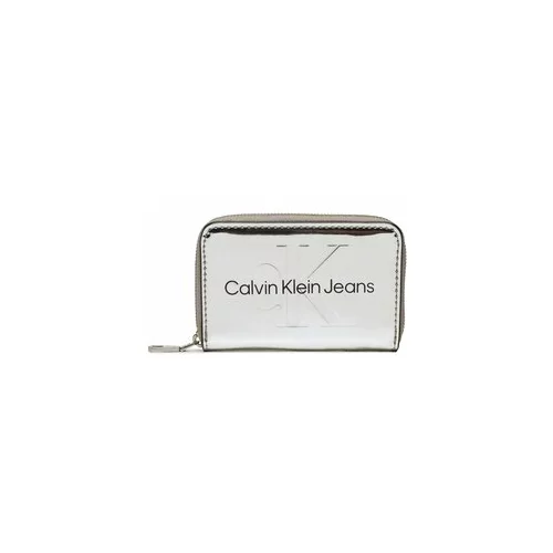 Calvin Klein Jeans Majhna ženska denarnica Sculpted Med Zip Around K60K610405 Srebrna