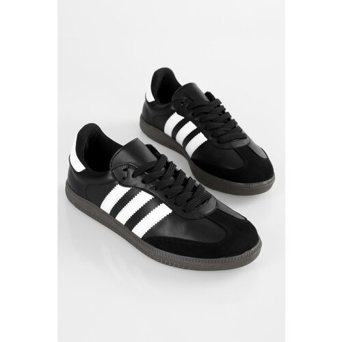 Shoeberry Women's Sambai Black and White Striped Flat Sneakers Cene