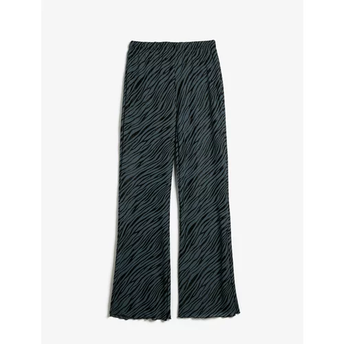 Koton Zebra Patterned Trousers with Elastic Waist.