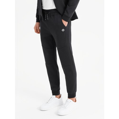 Ombre Men&amp;#039;s sweatpants with ribbed cuffs and decorative zipper - black Slike