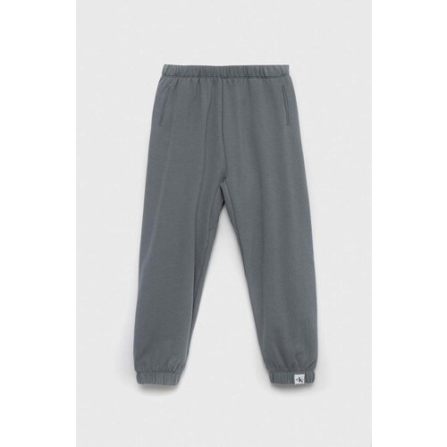 Calvin Klein Jeans Otro&amp;scaron;ki spodnji del trenirke siva barva Slike