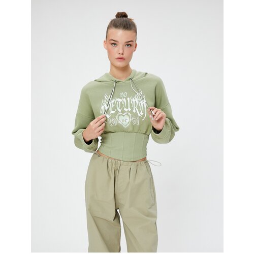 Koton Crop Sweatshirt with a Hooded Slim Fit Printed Corset Look. Slike
