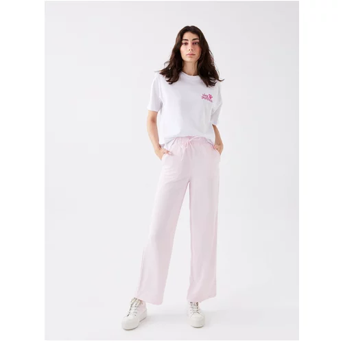 LC Waikiki Women's Trousers with an elastic waist, comfortable fit and straight pockets.