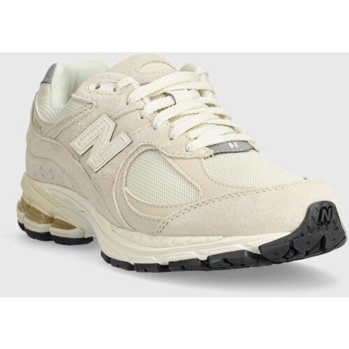 New Balance Superge M2002RCC bež barva Slike
